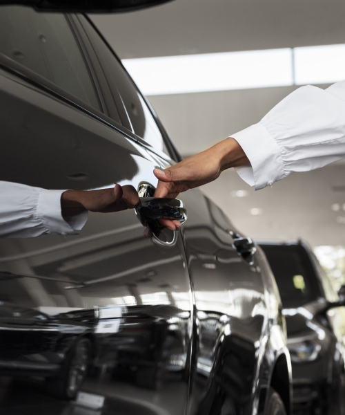 woman-enjoying-her-financially-independence-while-buying-car