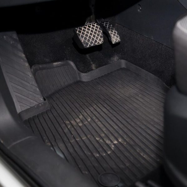 [freepicdownloader.com]-dirty-car-floor-mats-black-rubber-with-gas-pedals-brakes-workshop-detailing-vehicle-before-dry-cleaning-auto-service-industry-interior-sedan-large